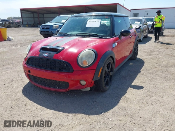 2010 MINI Hardtop S with VIN WMWMF7C51ATX43277, listed as a IAAI auction lot 42107871 with 102,886 mi miles and . Bid and sale history available at DreamBid. Image 2.