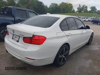 2012 BMW 3 Series 328i with VIN WBA3A5G57CNP16102, listed as a IAAI auction lot 42088407 with 70,608 mi miles and . Bid and sale history available at carsss.com. Image 4.