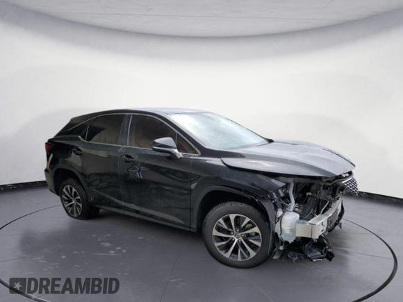 2021 Lexus RX with VIN 2T2AZMDA2MC302319, listed as a Copart auction lot 61712083 with 38,934 mi miles. Bid and sale history available at carsss.com. Image 4.