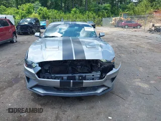 2021 Ford Mustang EcoBoost z VIN 1FA6P8TH1M5121107, wystawiony jako IAAI lot #42204097 z przebiegiem 51 542 mil mil oraz . Historia ofert i sprzedaży dostępna na DreamBid. Obrazek 12.