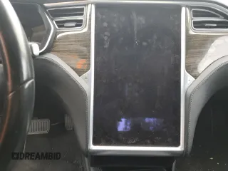 2014 Tesla Model S 60 with VIN 5YJSA1S14EFP56277, listed as a Copart auction lot 57162685 with Not provided miles and Salvage title. Bid and sale history available at DreamBid. Image 9.