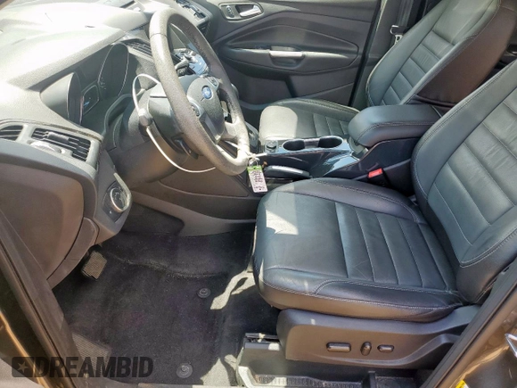 2015 Ford Escape Titanium with VIN 1FMCU0J92FUB80769, listed as a Copart auction lot 61988435 with 103,212 mi miles and Salvage title. Bid and sale history available at DreamBid. Image 7.