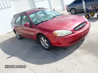 2000 Ford Taurus SE z VIN 1FAFP58S3YA252233, wystawiony jako IAAI lot #41947792 z przebiegiem 114 144 mil mil oraz . Historia ofert i sprzedaży dostępna na DreamBid. Obrazek 1.