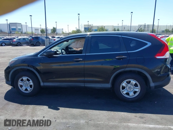 2014 Honda CR-V LX with VIN 3CZRM3H36EG704499, listed as a IAAI auction lot 41966876 with 74,054 mi miles. Bid and sale history available at carsss.com. Image 15.
