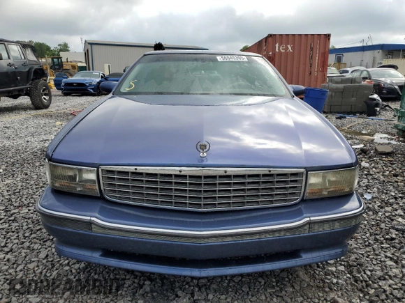 1995 Cadillac DeVille z VIN 1G6KD52B3SU243924, wystawiony jako Copart lot #56945395 z przebiegiem 72 878 mil mil oraz Szkoda całkowita • Salvage title. Historia ofert i sprzedaży dostępna na DreamBid. Obrazek 5.