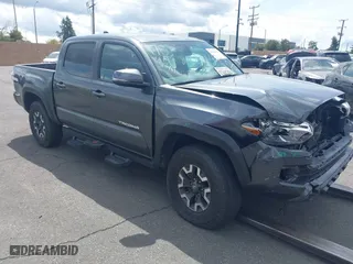 2023 Toyota Tacoma 4WD SR with VIN 3TMCZ5AN7PM534257, listed as a IAAI auction lot 41524436 with 28,886 mi miles. Bid and sale history available at carsss.com. Image 1.