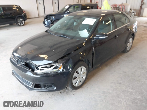 2013 Volkswagen Jetta SE z VIN 3VWDX7AJ7DM267911, wystawiony jako IAAI lot #42391353 z przebiegiem 42 248 mil mil oraz . Historia ofert i sprzedaży dostępna na DreamBid. Obrazek 6.