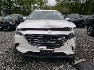 2022 Mazda CX-9 Touring with VIN JM3TCBCYXN0619317, listed as a Copart auction lot 58264755 with 139,478 mi miles and Salvage title. Bid and sale history available at DreamBid. Image 5.
