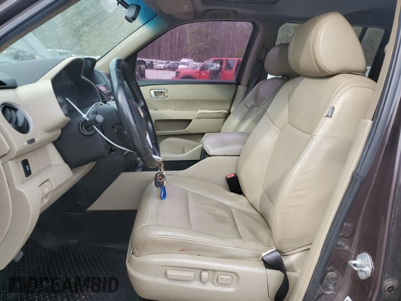 2012 Honda Pilot EX-L with VIN 5FNYF3H54CB002956, listed as a Copart auction lot 42767445 with 161,942 mi miles and Salvage Title. Bid and sale history available at carsss.com. Image 7.