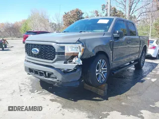 2021 Ford F-150 XL with VIN 1FTEW1EP0MFA56166, listed as a IAAI auction lot 41858793 with 48,498 mi miles and . Bid and sale history available at DreamBid. Image 2.