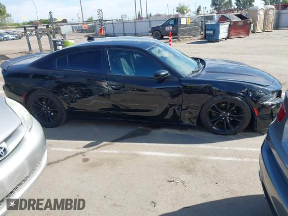 2016 Dodge Charger SXT with VIN 2C3CDXHG6GH146764, listed as a IAAI auction lot 42020618 with 154,693 mi miles and . Bid and sale history available at carsss.com. Image 13.