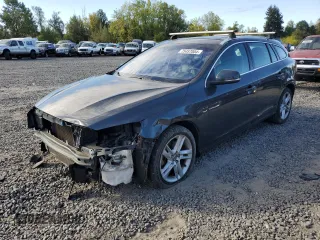 2015 Volvo V60 T5 Drive-E Premier with VIN YV126MEBXF1192999, listed as a Copart auction lot 75457004 with 84,937 mi miles and Salvage Title. Bid and sale history available at carsss.com. Image 1.