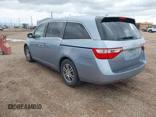2011 Honda Odyssey EX-L with VIN 5FNRL5H64BB085479, listed as a IAAI auction lot 42404637 with 185,624 mi miles and . Bid and sale history available at DreamBid. Image 3.