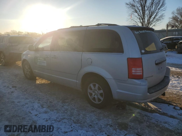 2010 Chrysler Town & Country Touring with VIN 2A4RR5DX8AR207111, listed as a Copart auction lot 41771685 with 196,743 mi miles and Salvage Title. Bid and sale history available at carsss.com. Image 2.