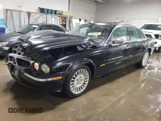 2005 Jaguar XJ VDP with VIN SAJWA82C65SG44373, listed as a Copart auction lot 84091444 with 141,993 mi miles and Salvage Title. Bid and sale history available at carsss.com. Image 1.