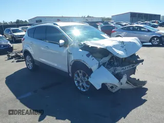 2015 Ford Escape Titanium with VIN 1FMCU0J94FUA69088, listed as a IAAI auction lot 41810406 with 167,749 mi miles. Bid and sale history available at carsss.com. Image 1.