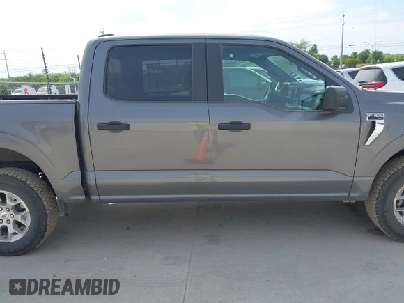 2023 Ford F-150 XL with VIN 1FTFW1E87PKF04735, listed as a IAAI auction lot 42048913 with 54,893 mi miles. Bid and sale history available at carsss.com. Image 13.