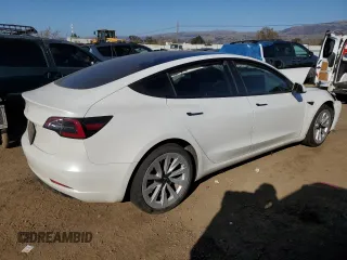 2021 Tesla Model 3 Standard Range Plus with VIN 5YJ3E1EA0MF017765, listed as a Copart auction lot 42776525 with 54,873 mi miles and Salvage Title. Bid and sale history available at carsss.com. Image 3.