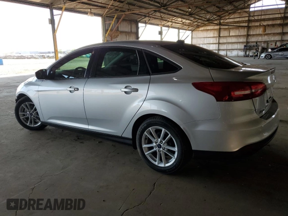 2015 Ford Focus SE with VIN 1FADP3F20FL232196, listed as a Copart auction lot 64829835 with 31,294 mi miles and Salvage title. Bid and sale history available at DreamBid. Image 2.
