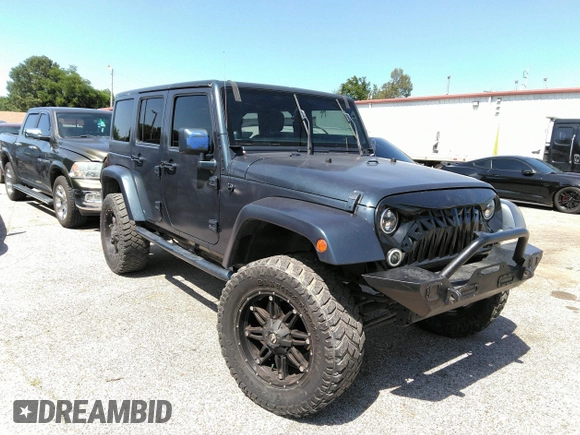 2013 Jeep Wrangler Unlimited Sport z VIN 1C4BJWDG1DL660844, wystawiony jako IAAI lot #42347284 z przebiegiem 168 709 mil mil oraz . Historia ofert i sprzedaży dostępna na DreamBid. Obrazek 1.