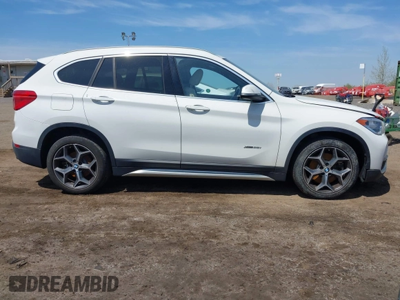 2018 BMW X1 xDrive28i with VIN WBXHT3C39J5F91912, listed as a IAAI auction lot 42099647 with 79,023 mi miles and . Bid and sale history available at DreamBid. Image 13.