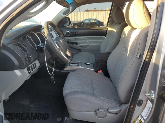 2014 Toyota Tacoma PreRunner with VIN 3TMKU4HNXEM041311, listed as a Copart auction lot 84065684 with 212,473 mi miles and Salvage title. Bid and sale history available at DreamBid. Image 7.