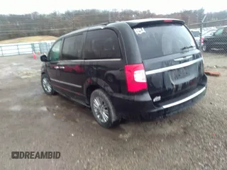 2015 Chrysler Town & Country Touring L with VIN 2C4RC1CG7FR539937, listed as a IAAI auction lot 41817807 with 158,400 mi miles and . Bid and sale history available at carsss.com. Image 3.