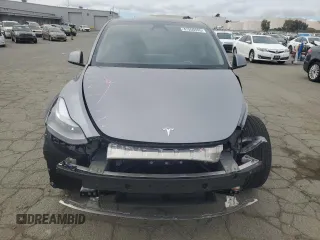 2025 Tesla Model Y Long Range with VIN 7SAYGDED7SF227582, listed as a Copart auction lot 47556595 with 5,340 mi miles and Salvage Title. Bid and sale history available at DreamBid. Image 5.