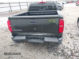 2018 Chevrolet Colorado 4WD LT z VIN 1GCGTCEN2J1235085, wystawiony jako IAAI lot #42192629 z przebiegiem 83 914 mil mil oraz . Historia ofert i sprzedaży dostępna na DreamBid. Obrazek 16.
