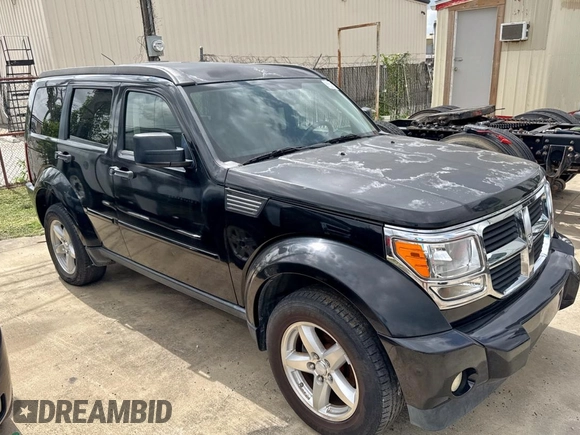 2007 Dodge Nitro SLT z VIN 1D8GU58K77W690568, wystawiony jako Copart lot #61766405 z przebiegiem 177 426 mil mil oraz Czysty tytuł • Clean title. Historia ofert i sprzedaży dostępna na DreamBid. Obrazek 1.