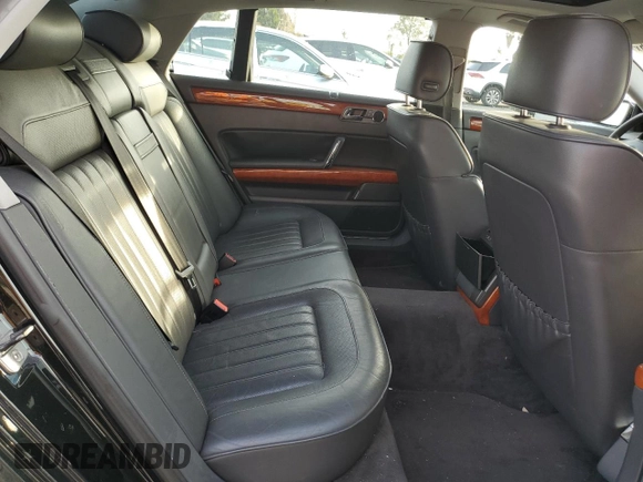 2006 Volkswagen Phaeton z VIN WVWAF03D268002733, wystawiony jako Copart lot #44980475 z przebiegiem 90 539 mil mil oraz Czysty tytuł • Clean title. Historia ofert i sprzedaży dostępna na DreamBid. Obrazek 10.
