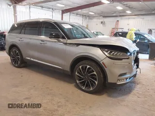 2021 Lincoln Aviator Reserve z VIN 5LM5J7XC4MGL07348, wystawiony jako IAAI lot #42043103 z przebiegiem 49 916 mil mil oraz . Historia ofert i sprzedaży dostępna na DreamBid. Obrazek 1.