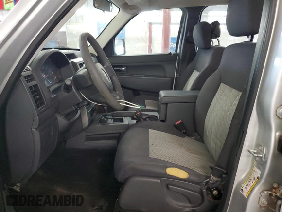 2010 Jeep Liberty Sport with VIN 1J4PN2GK6AW101135, listed as a Copart auction lot 58216735 with 202,901 mi miles and Clean title. Bid and sale history available at DreamBid. Image 7.