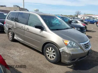 2010 Honda Odyssey EX-L with VIN 5FNRL3H68AB055744, listed as a IAAI auction lot 42107273 with 193,289 mi miles. Bid and sale history available at carsss.com. Image 1.