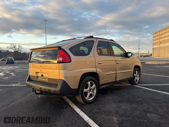 2002 Pontiac Aztek z VIN 3G7DB03E02S561022, wystawiony jako Copart lot #89014985 z przebiegiem 153 845 mil mil oraz Czysty tytuł • Clean title. Historia ofert i sprzedaży dostępna na DreamBid. Obrazek 4.