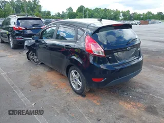 2019 Ford Fiesta SE z VIN 3FADP4EJ7KM102259, wystawiony jako IAAI lot #42265135 z przebiegiem 94 445 mil mil oraz . Historia ofert i sprzedaży dostępna na DreamBid. Obrazek 3.