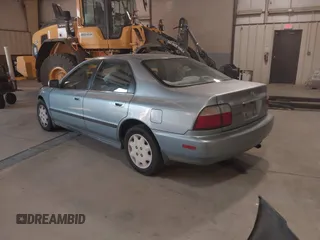 1996 Honda Accord LX with VIN 1HGCD563XTA141867, listed as a IAAI auction lot 41015252 with 420,800 mi miles and . Bid and sale history available at carsss.com. Image 3.