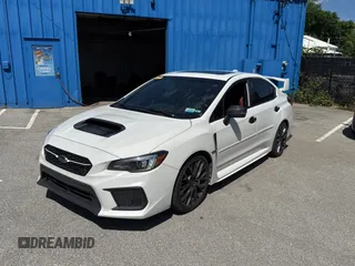 2018 Subaru WRX STI Launch z VIN JF1VA2W60J9804392, wystawiony jako Copart lot #58350815 z przebiegiem 112 607 mil mil oraz Tytuł czysty. Historia ofert i sprzedaży dostępna na DreamBid. Obrazek 2.