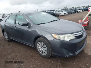 2014 Toyota Camry L with VIN 4T1BF1FK5EU403313, listed as a IAAI auction lot 42141338 with 185,925 mi miles and . Bid and sale history available at DreamBid. Image 1.