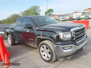 2016 GMC Sierra 1500 SLE with VIN 1GTV2MEC1GZ162302, listed as a IAAI auction lot 42049040 with 183,443 mi miles. Bid and sale history available at carsss.com. Image 13.