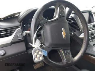 2016 Chevrolet Tahoe LT with VIN 1GNSCBKCXGR329921, listed as a IAAI auction lot 41915654 with 273,945 mi miles and . Bid and sale history available at DreamBid. Image 11.