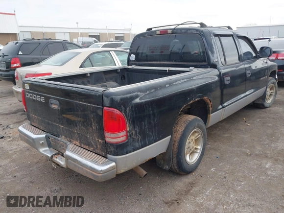2000 Dodge Dakota Sport with VIN 1B7GL2AX4YS607628, listed as a IAAI auction lot 41115728 with Not provided miles and . Bid and sale history available at DreamBid. Image 4.