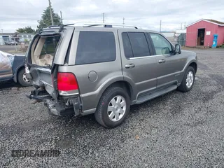 2003 Lincoln Aviator Premium z VIN 5LMEU78H93ZJ29120, wystawiony jako IAAI lot #42239414 z przebiegiem 196 479 mil mil oraz . Historia ofert i sprzedaży dostępna na DreamBid. Obrazek 4.