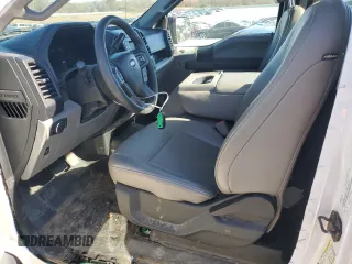 2019 Ford F-150 XL with VIN 1FTMF1CB3KKE88029, listed as a Copart auction lot 38526814 with 99,657 mi miles and Salvage title. Bid and sale history available at DreamBid. Image 7.