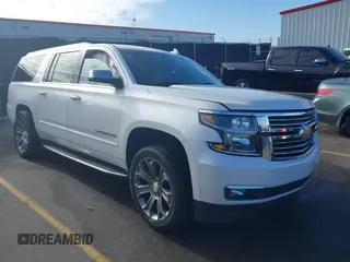 2019 Chevrolet Suburban LT with VIN 1GNSCJKC1KR146104, listed as a IAAI auction lot 41103371 with 108,727 mi miles. Bid and sale history available at carsss.com. Image 1.