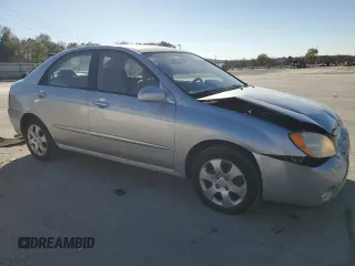 2006 Kia Spectra EX with VIN KNAFE121965372856, listed as a Copart auction lot 77365514 with 316,947 mi miles and Clean Title. Bid and sale history available at carsss.com. Image 4.