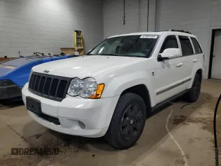 2009 Jeep Grand Cherokee Limited with VIN 1J8HR58T99C523347, listed as a Copart auction lot 61905485 with 158,003 mi miles and Salvage title. Bid and sale history available at DreamBid. Image 1.