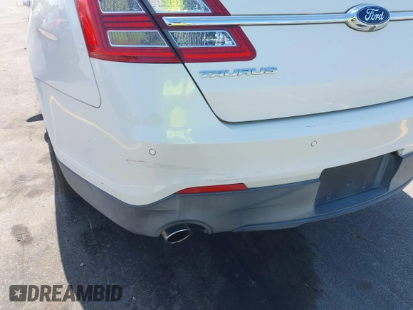 2014 Ford Taurus SEL with VIN 1FAHP2E86EG132676, listed as a IAAI auction lot 41943392 with 183,633 mi miles. Bid and sale history available at carsss.com. Image 15.