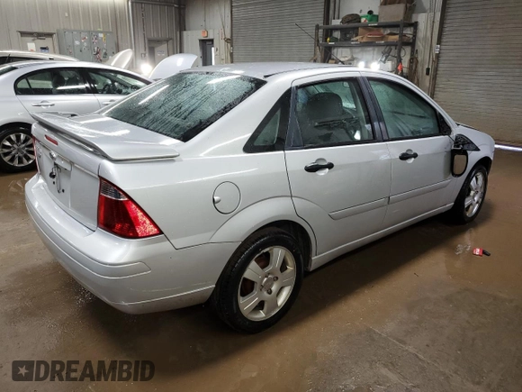 2007 Ford Focus S z VIN 1FAHP34N37W262789, wystawiony jako Copart lot #50814405 z przebiegiem 56 604 mil mil oraz Szkoda całkowita • Salvage title. Historia ofert i sprzedaży dostępna na DreamBid. Obrazek 3.