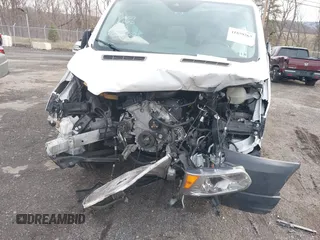 2019 Ford Transit Passenger XL z VIN 1FBZX2ZM2KKB63281, wystawiony jako IAAI lot #41859263 z przebiegiem 39 294 mil mil oraz . Historia ofert i sprzedaży dostępna na DreamBid. Obrazek 6.